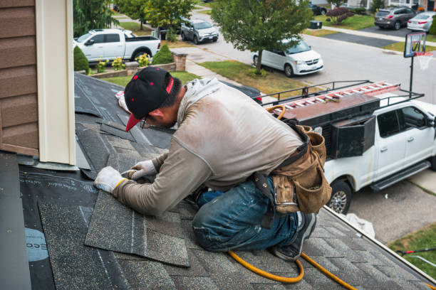 Professional Gutter Installation technician working in East Walpole, MA